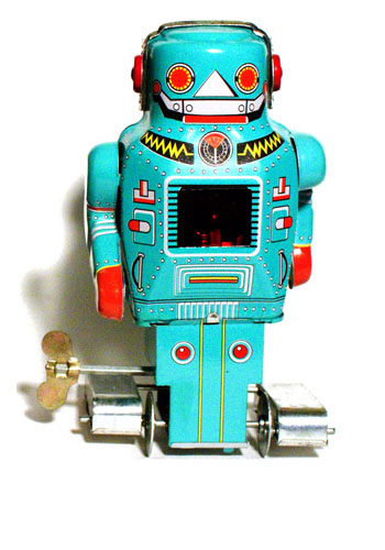 A classic windup diecast toy robot, with lights and sparks