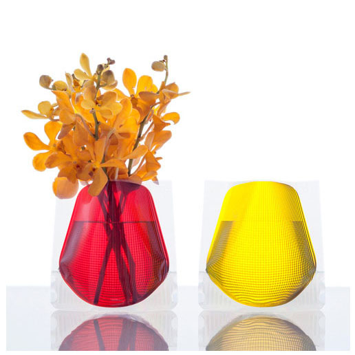 a set of four popup vinyl vases in bright colors